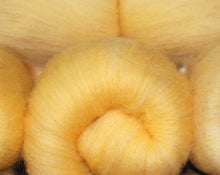 Hand carded Merino top dyed with Annatto